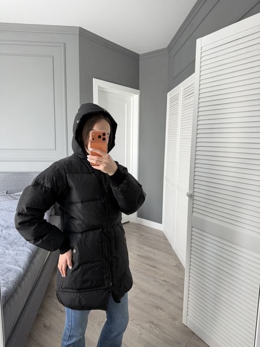 Damen Peak Performance Daunenjacke Schwarz 34